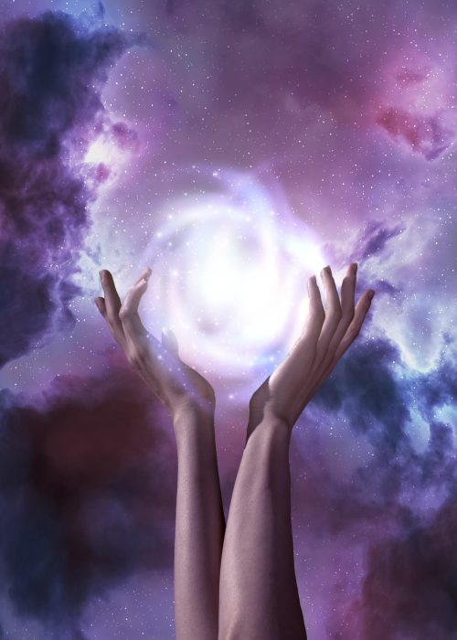 adult-holding-ball-light