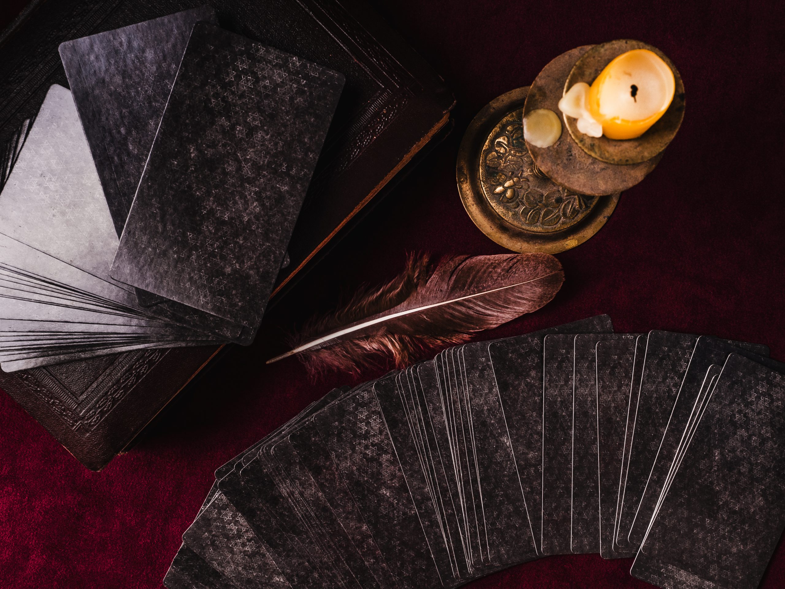 Tarot cards and esoteric concept. Magic rituals. Mystical table with details. View from above. Close-up